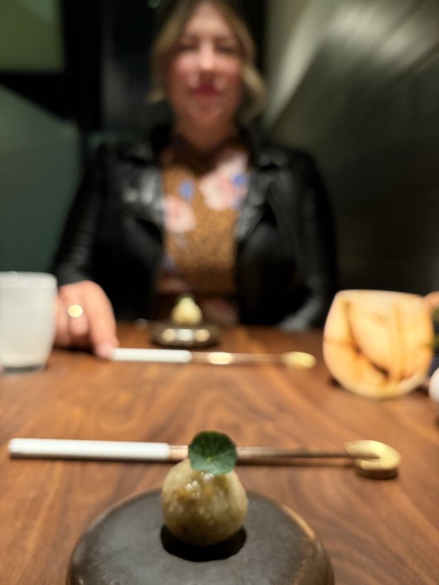 Intimate Dining Moment with Artistic Dessert Presentation