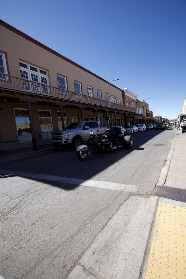 Historic Downtown Street with Classic Cars and Western Architecture