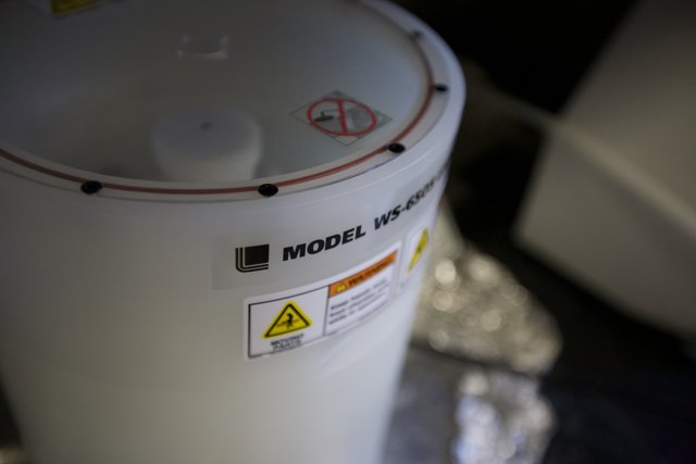 Labeled White Container