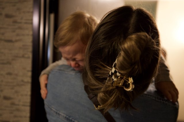 Intimate Embrace: Three Women Sharing a Warm Hug