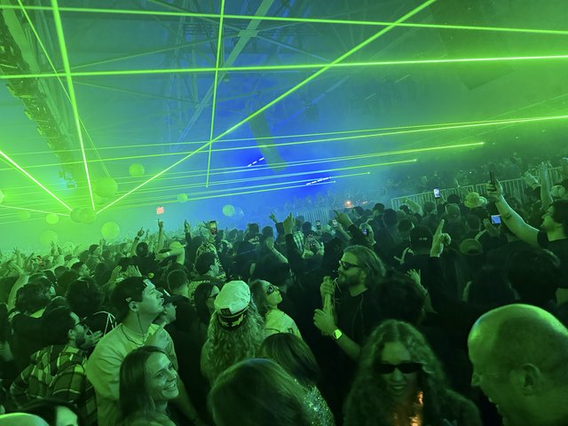 Laser Light Show Electrifies Packed Concert Crowd