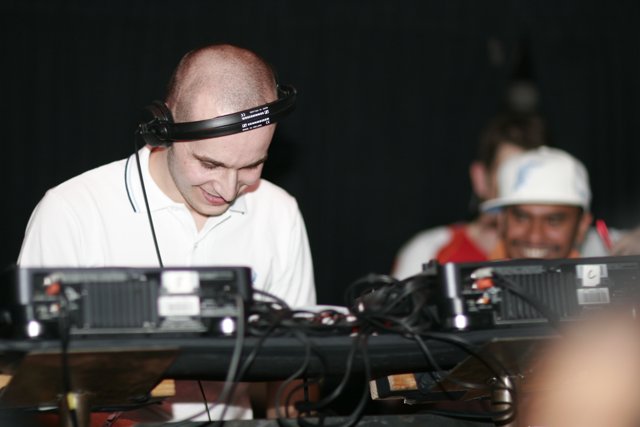 DJ Craze Entertains with Headphones on