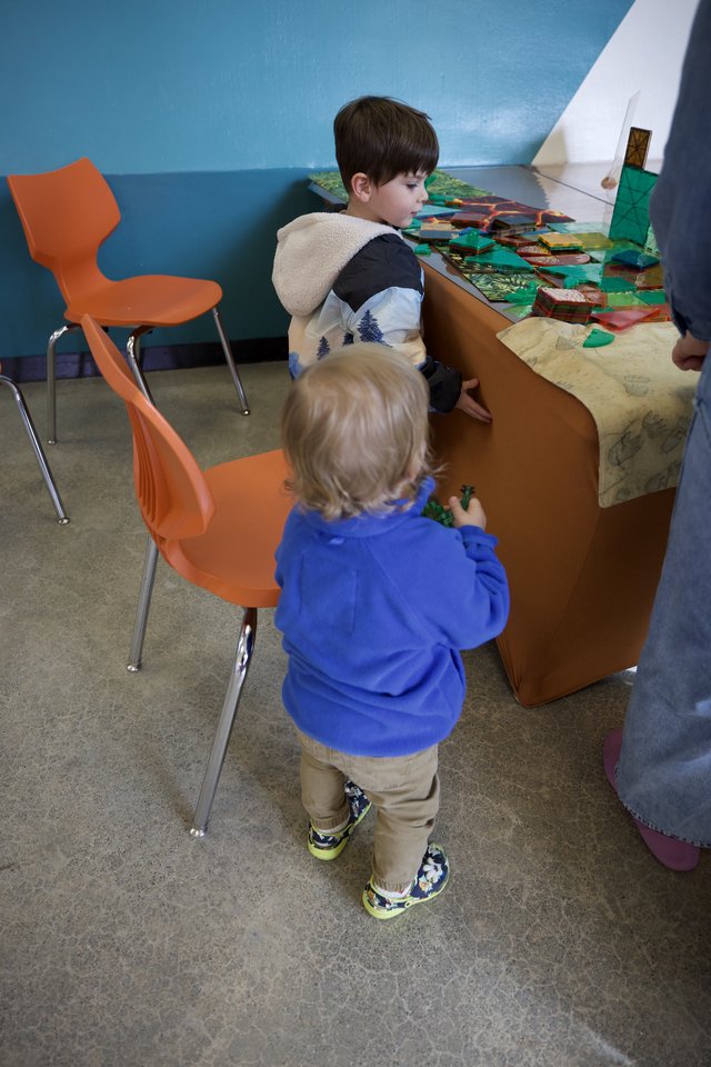 Children Engaged in Interactive Play at Learning Center