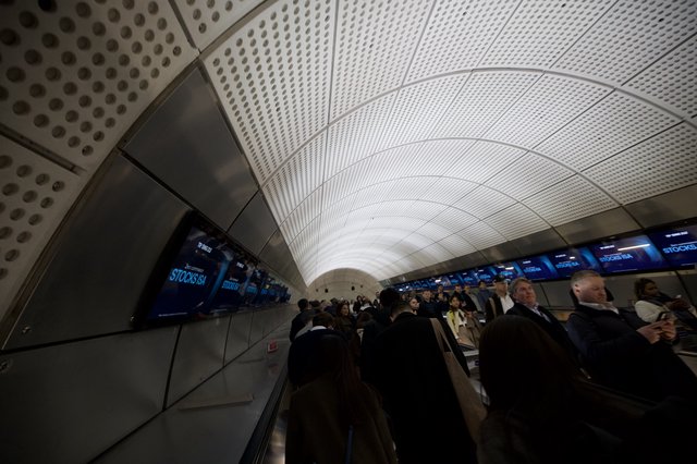 Curved Escalator Tunnel at Canary Wharf Underground Station