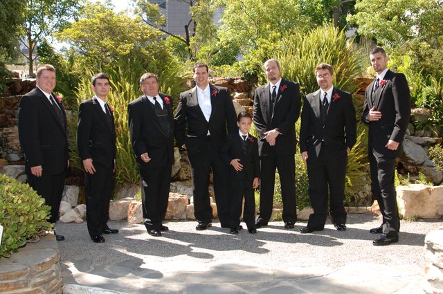 Groomsmen Pose in Garden Before Wedding Ceremony