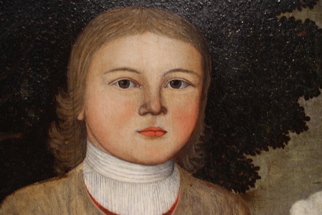 Young Boy with a White Collar