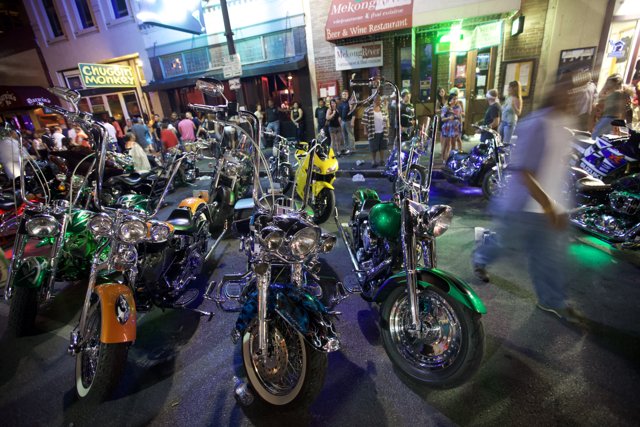 Motorbikes parked outside storefront