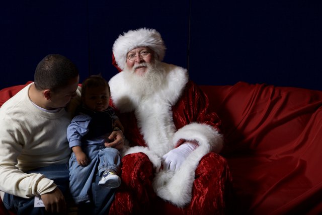 Santa, Baby, and a Red Couch