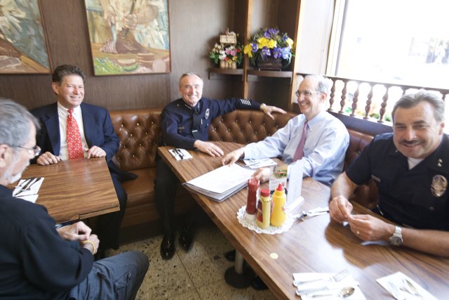 Mayday Rally Attendees Meeting at Local Restaurant