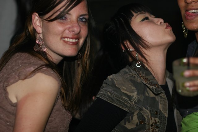 Two Women Dancing at a Nightclub Party 2006