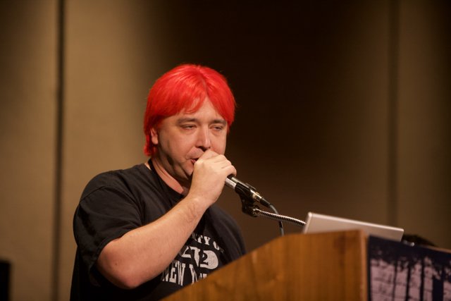 Red Haired Man on the Mic