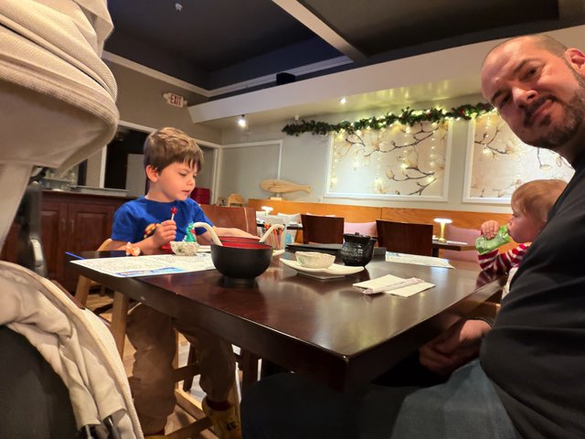 Family Dinner Time at Asian Restaurant