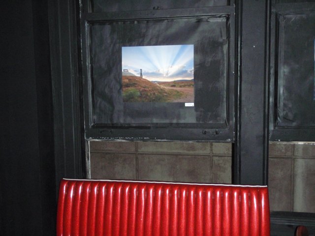 The Red Bench in Front of the Window