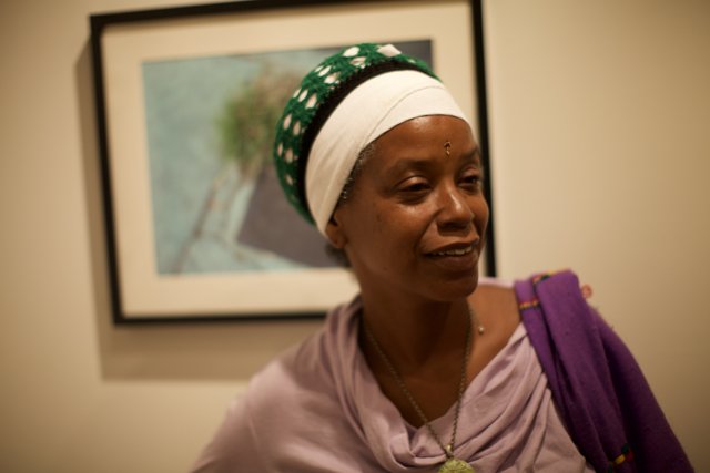 Portrait of a Woman in a Turban and Purple Shirt