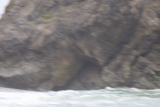 Rugged Coastal Cliffs Battered by Churning Ocean Waves