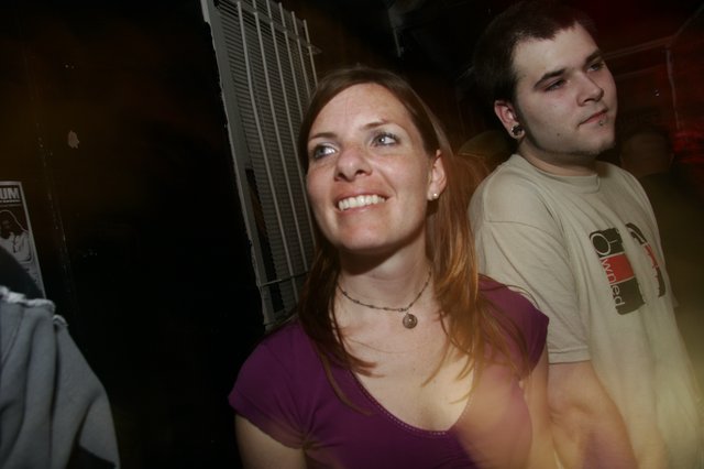 Smiling Woman at Nighttime Outdoor Gathering 2006