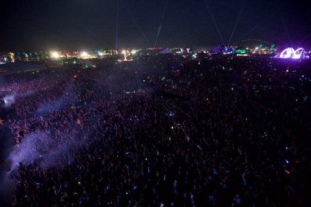 The Night Sky Ignites with Flares and Fireworks at Coachella Concert