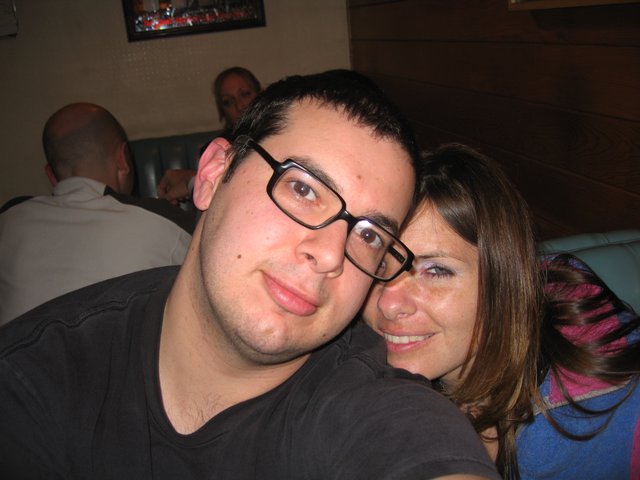 Friends Posing Close Together at a Casual Bar