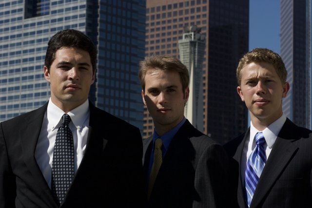 Three Men in Sharp Suits Take on the City