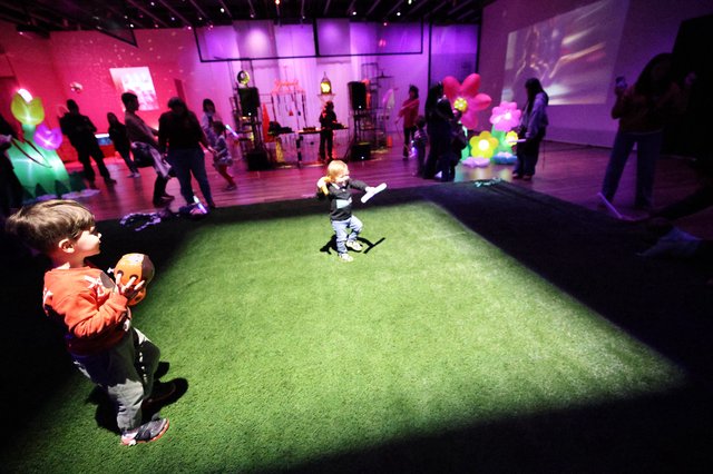 Children Playing at Interactive Baby Rave Installation
