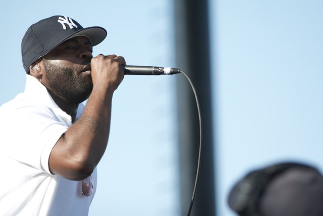 Black Thought Performing in a Baseball Cap
