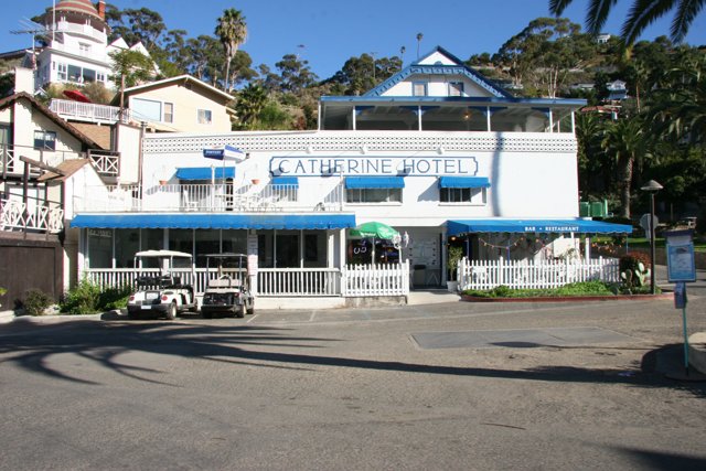 Blue Awnings on White Building