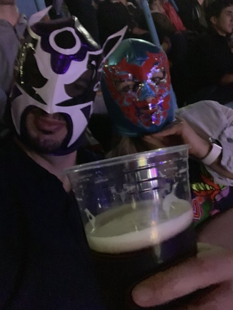 Masked Wrestler Drinks with Friends