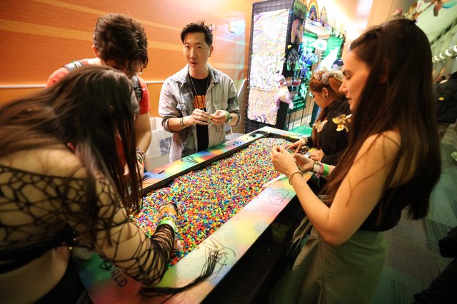 Festival Attendees Craft Kandi Bracelets at Wobbleland