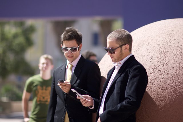Two Men in Formal Wear and Sunglasses