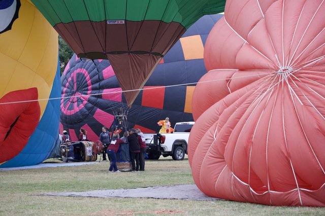 Ground Crew Inflates Balloons at Hot Air Festival