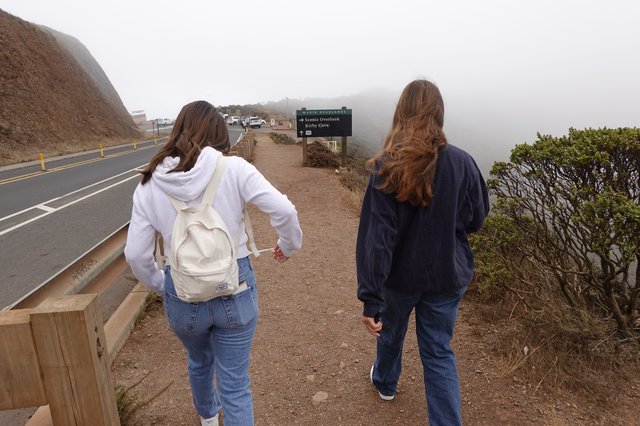 Two Friends Walking to Scenic Overlook