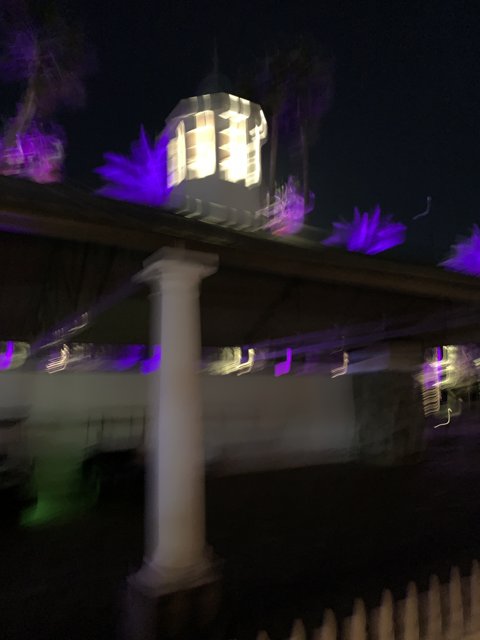 Purple Lights Illuminate Empire Polo Club Tower