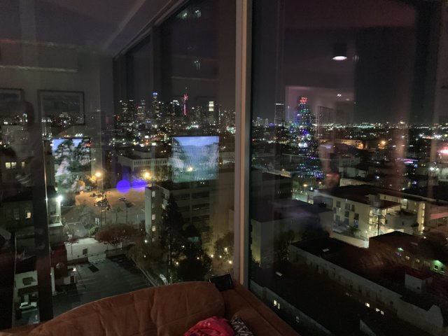 Urban Night Skyline from Living Room Window