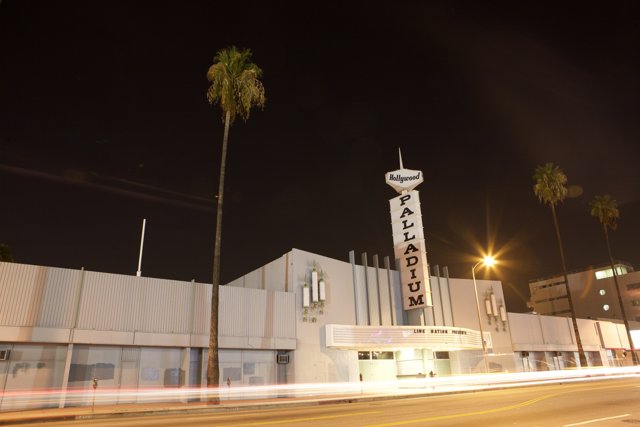 Illuminated Landmark: Clock Tower and City Theater