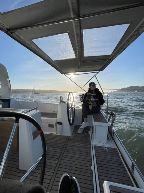 Captain and Crew at the Helm of the Yacht