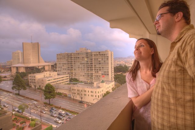 Couple Gazing Over San Francisco Cityscape at Dusk