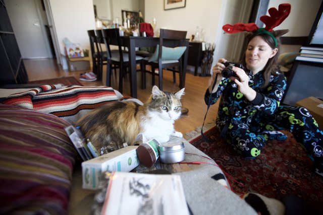 Christmas Morning Photography: Feline Model and Her Person