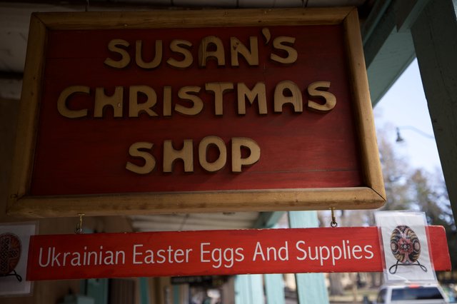 Susan's Christmas Shop Sign with Ukrainian Easter Eggs