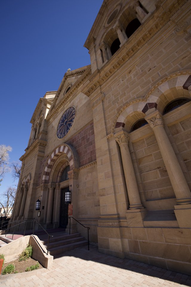Historic Romanesque Cathedral Facade with Bell Tower