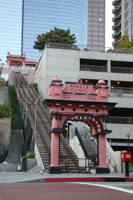 Pink Urban Building with Staircase and Handrail
