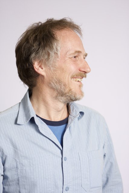 Happy Tim O'Reilly in Blue Shirt and Beard