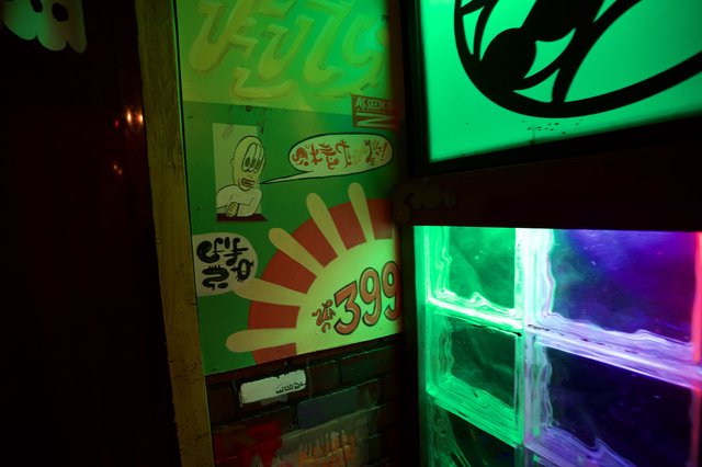 Neon Retro Gaming Corner with Glass Block Wall