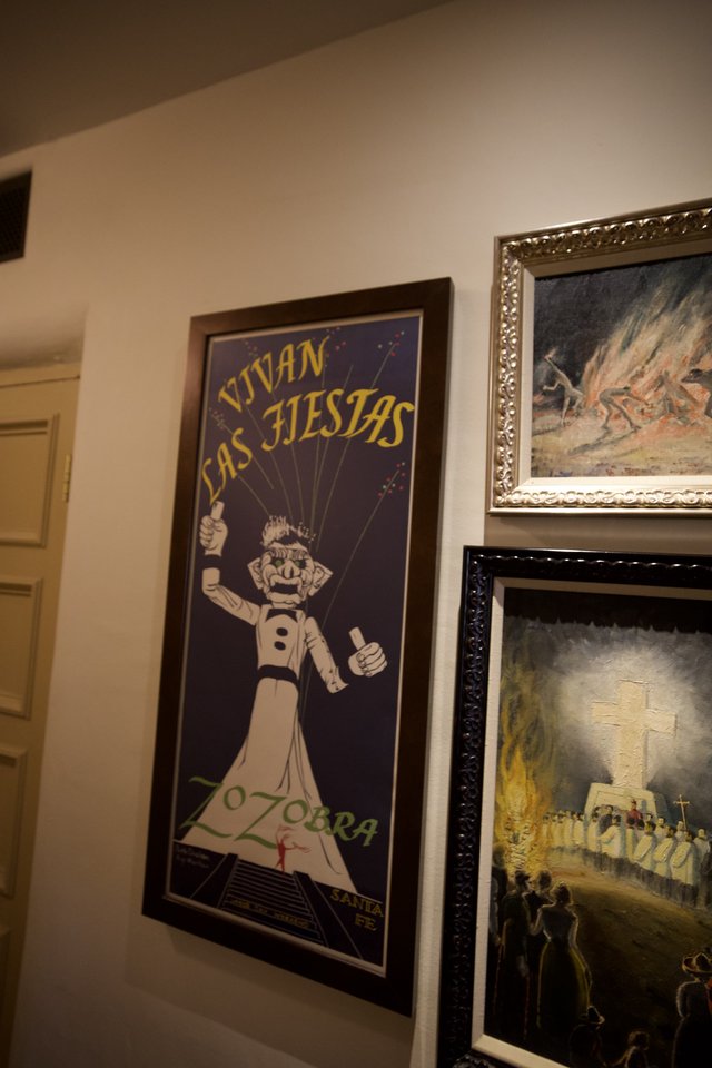 Framed Vintage Fiesta Poster and Religious Art Display