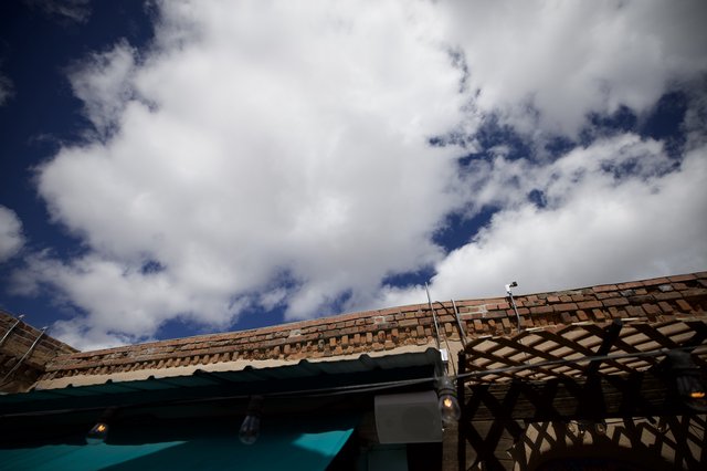 Adobe Architecture Under Dramatic Desert Sky