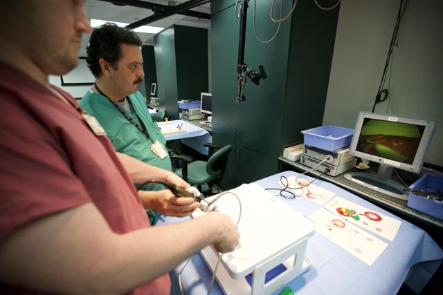 Two Men in a High-Tech Hospital Room