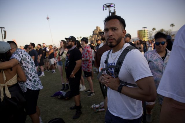 Amidst the Crowd: A Moment of Reflection at Coachella 2024