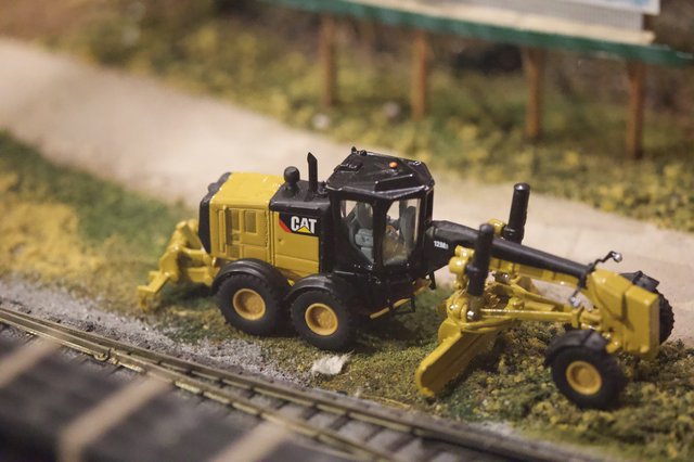 CAT 12M Motor Grader Scale Model on Diorama