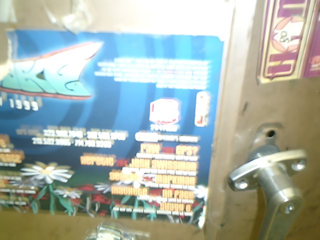 Advertisement Poster for Arcade Game Machine in Bathroom