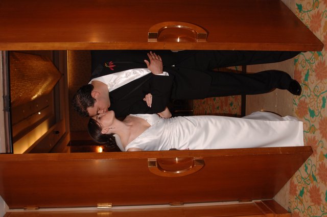 Newlyweds Share First Kiss at Reception Doorway