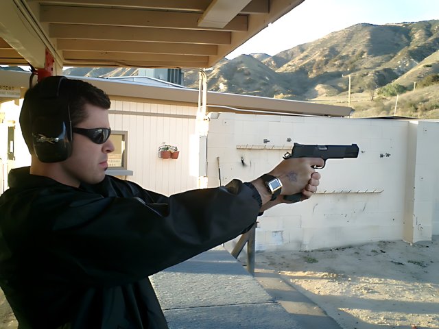 Armed and Dangerous Caption: Dan B shows off his firearm while enjoying the view of the Angeles ranges.